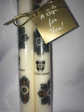 Load image into Gallery viewer, Pair of stick candles with St Davids Cathedral Shield and a picture of the Rose Windows
