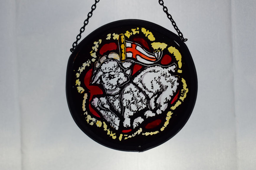 Glass Window Decoration depicting The Lamb of God, hand painted. Framed with traditional stained glass lead and hung with trace chain
